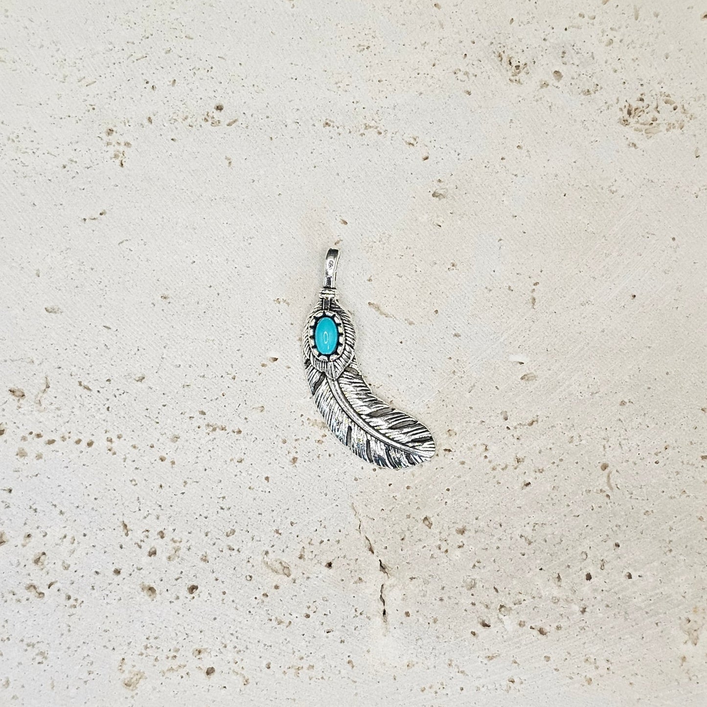 Turquoise Curved Feather