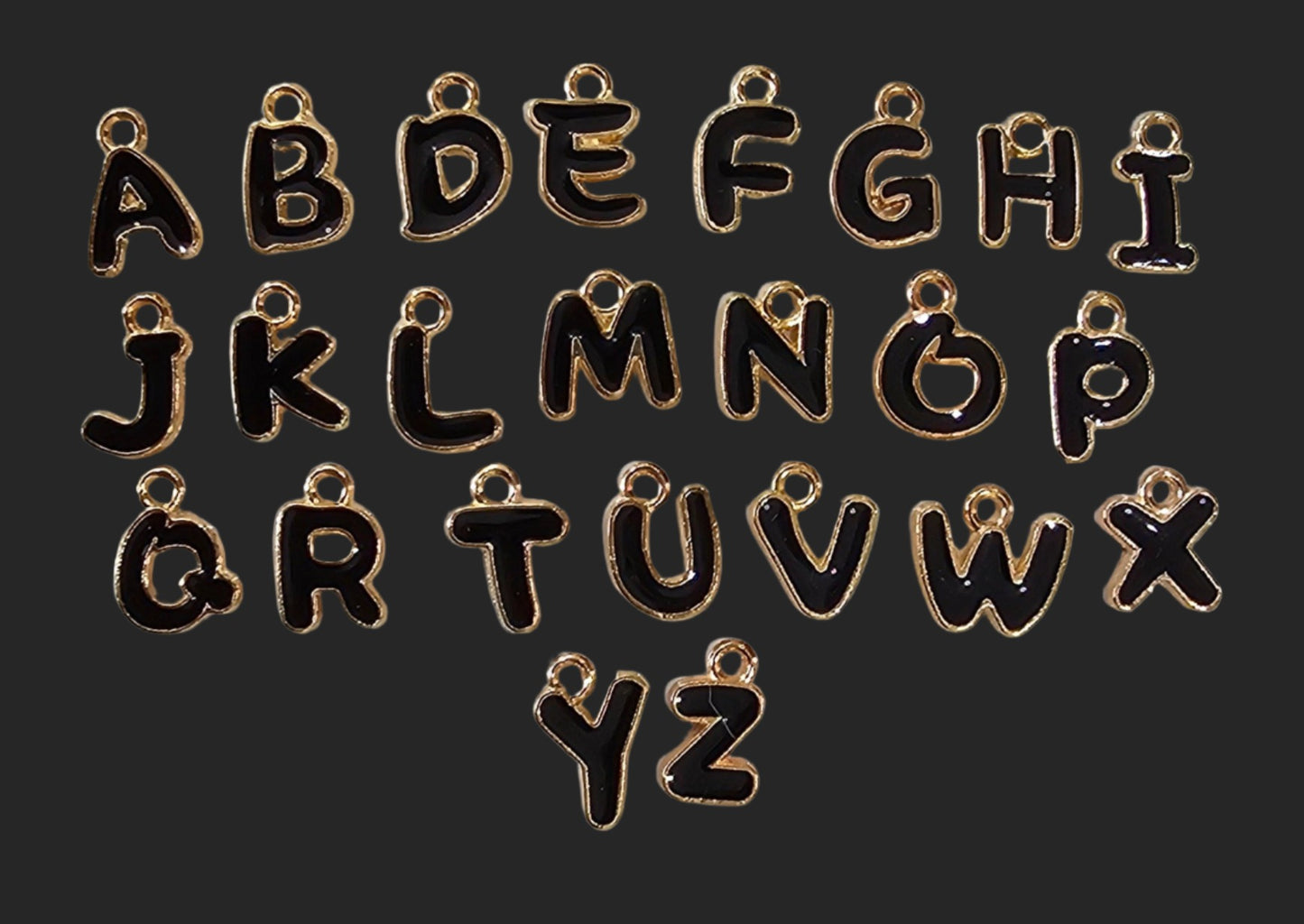 Black Handwritten/ Gold Outlined Letters