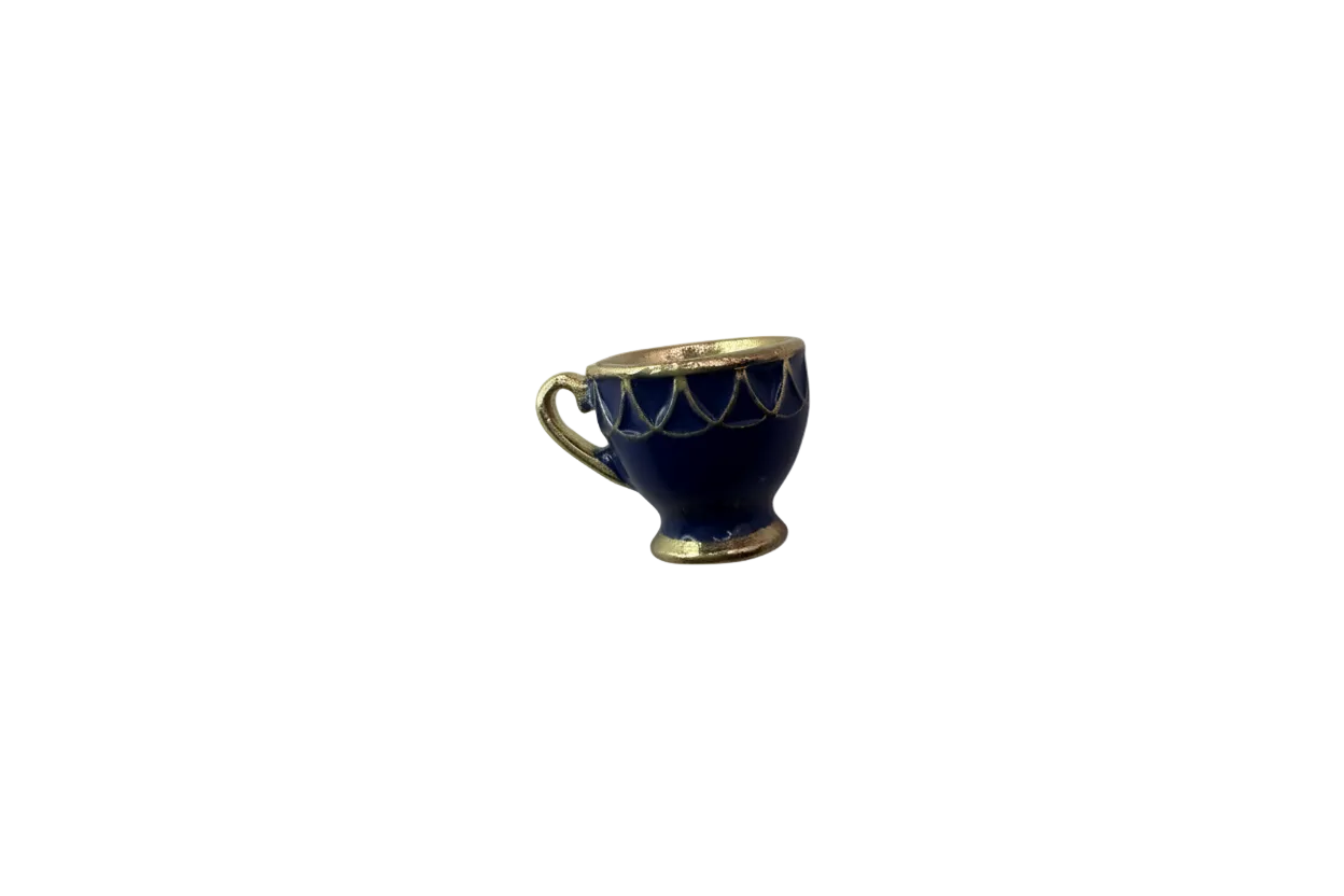 Navy enamel teacup with gold rim and handle