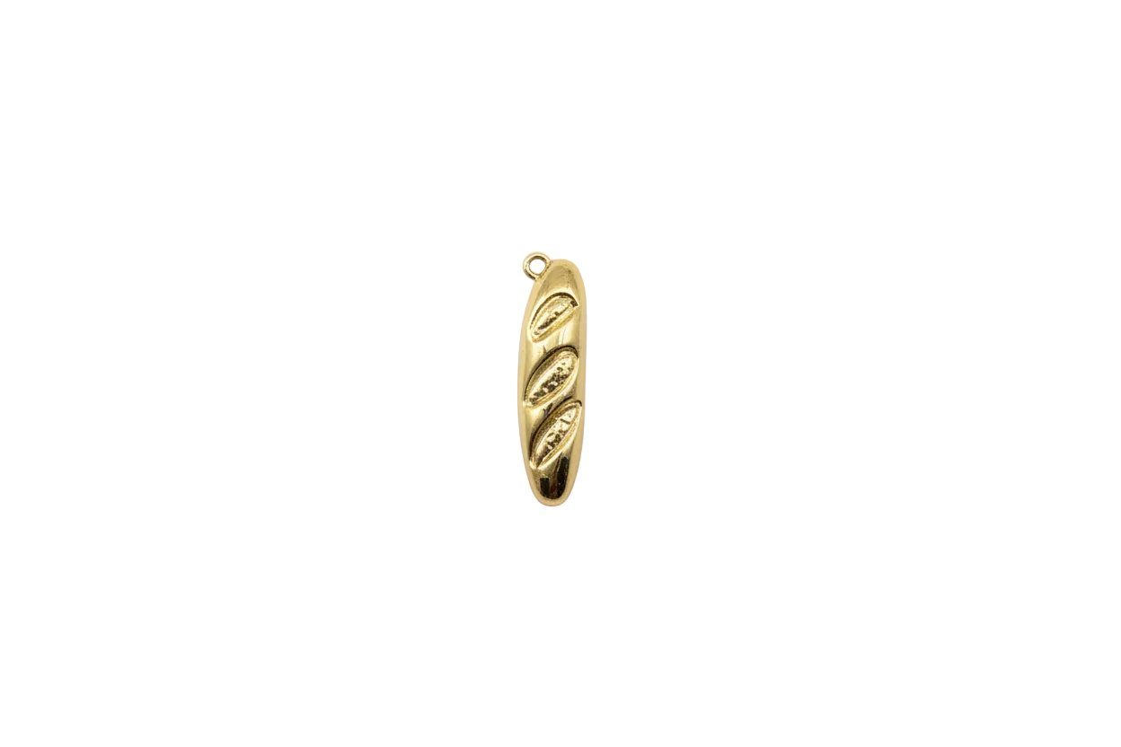 Gold baguette loaf with scored slashes