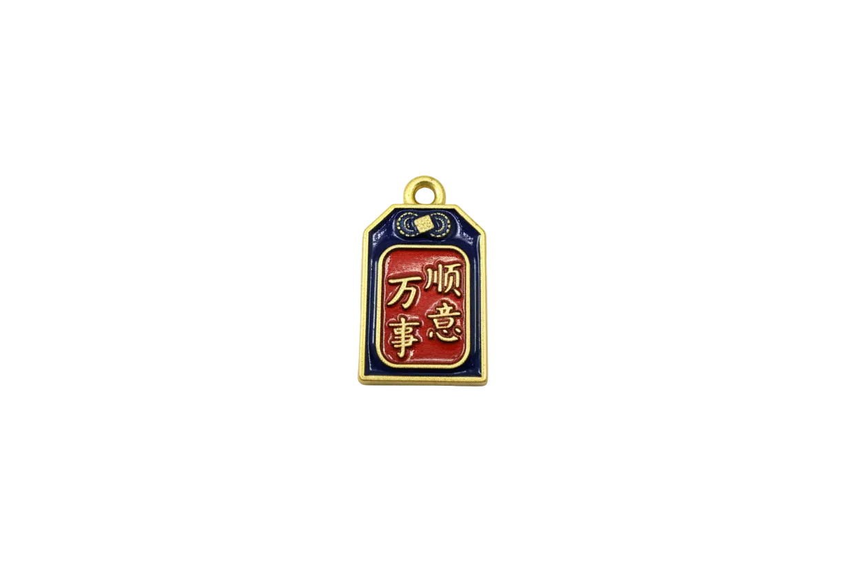Navy and red enamel amulet tag with raised gold script