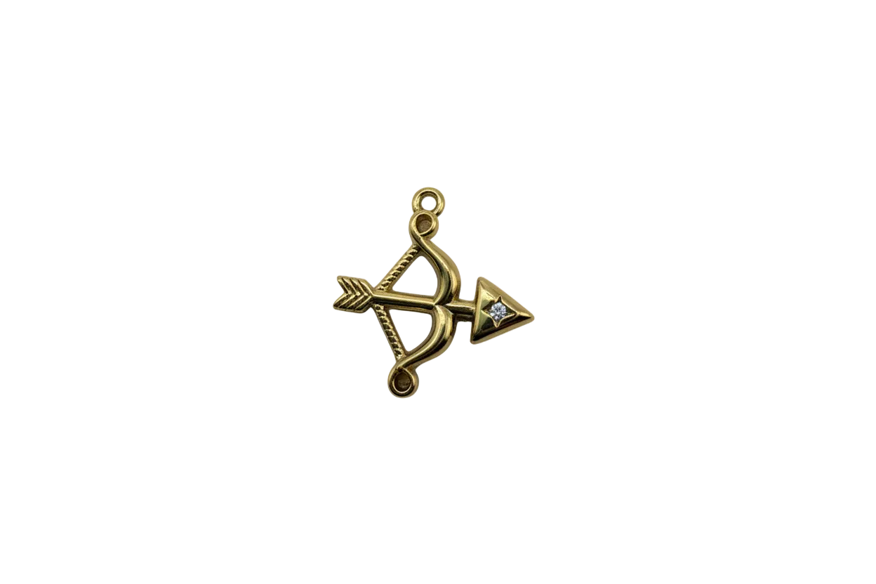 Gold bow and arrow with clear gemstone accent