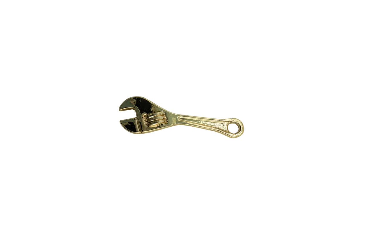 Gold wrench tool pendant with sculpted details