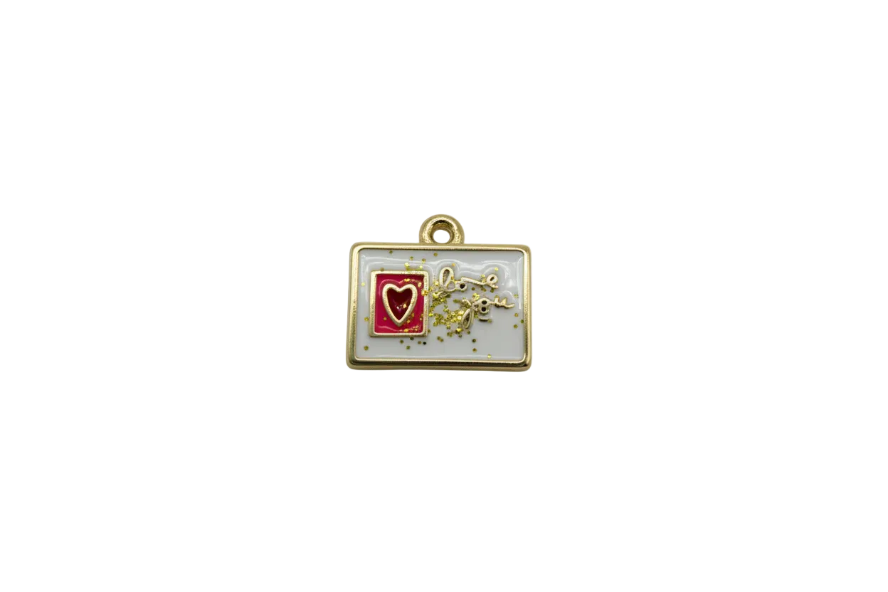 White enamel 'love you' rectangle with pink panel, red heart, and gold confetti