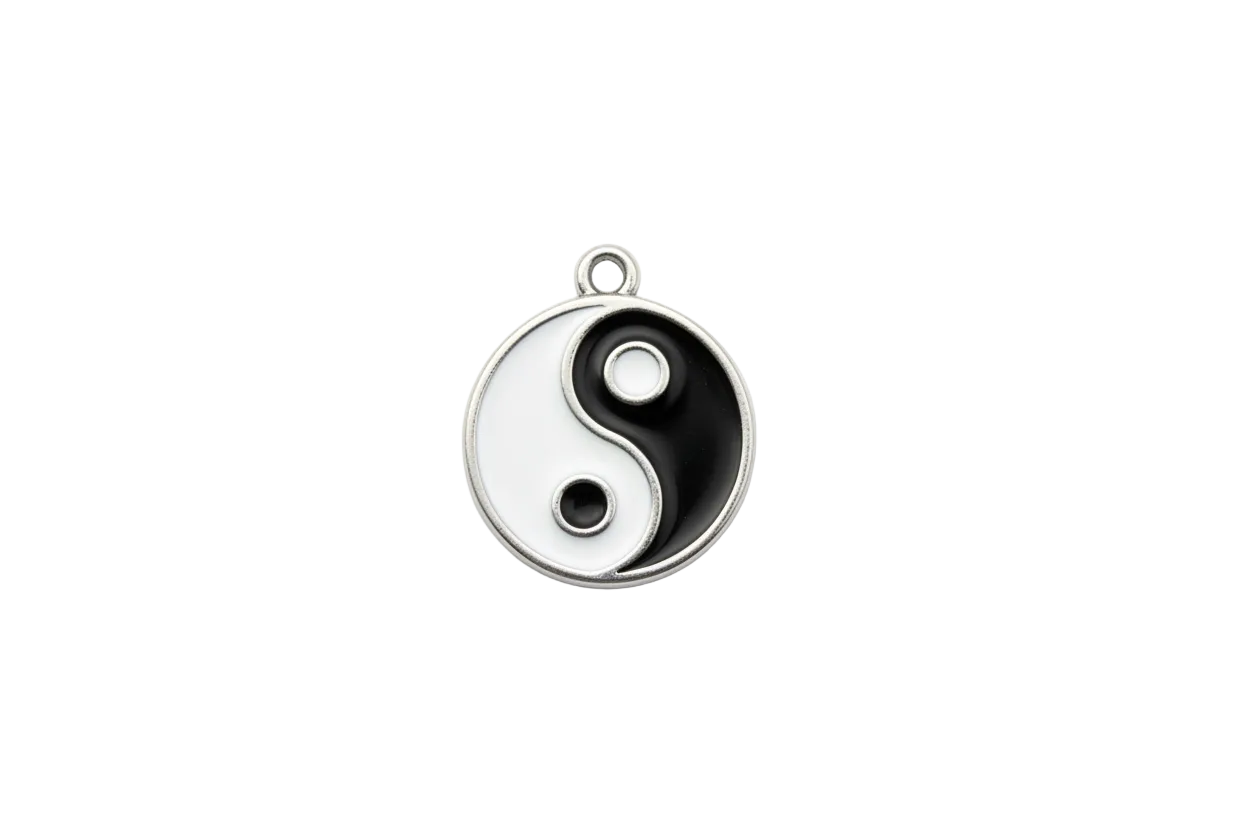Black and white yin yang disc in polished silver