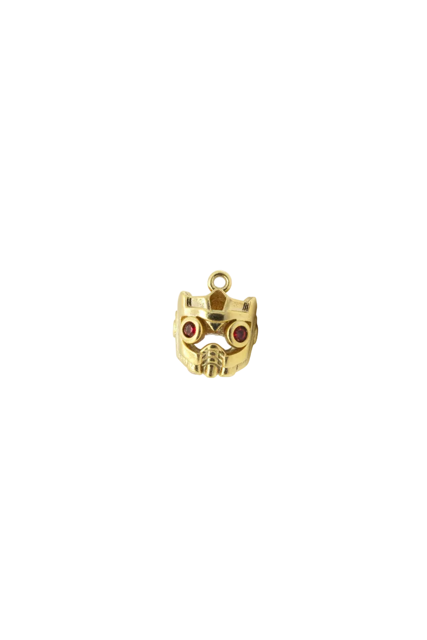 Gold skull head with red gem eyes