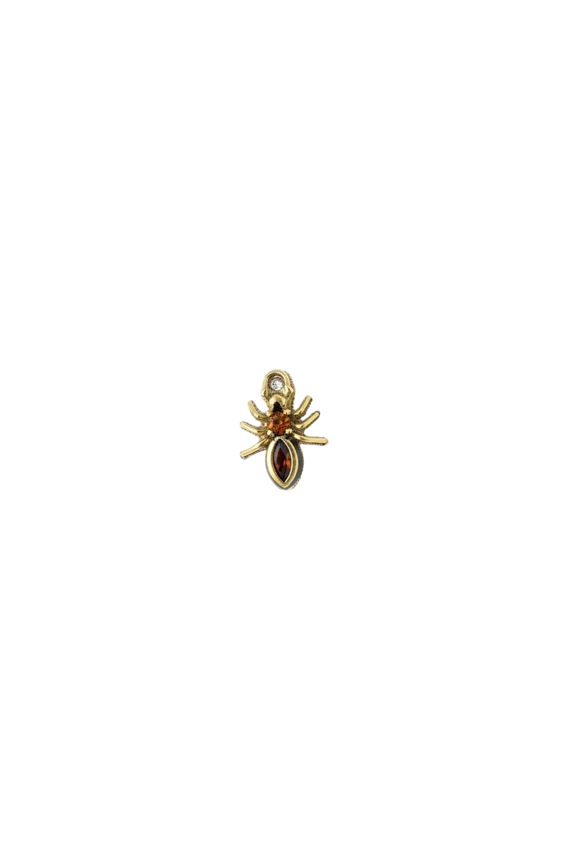 Gold spider with orange gem center and deep red marquise gem body