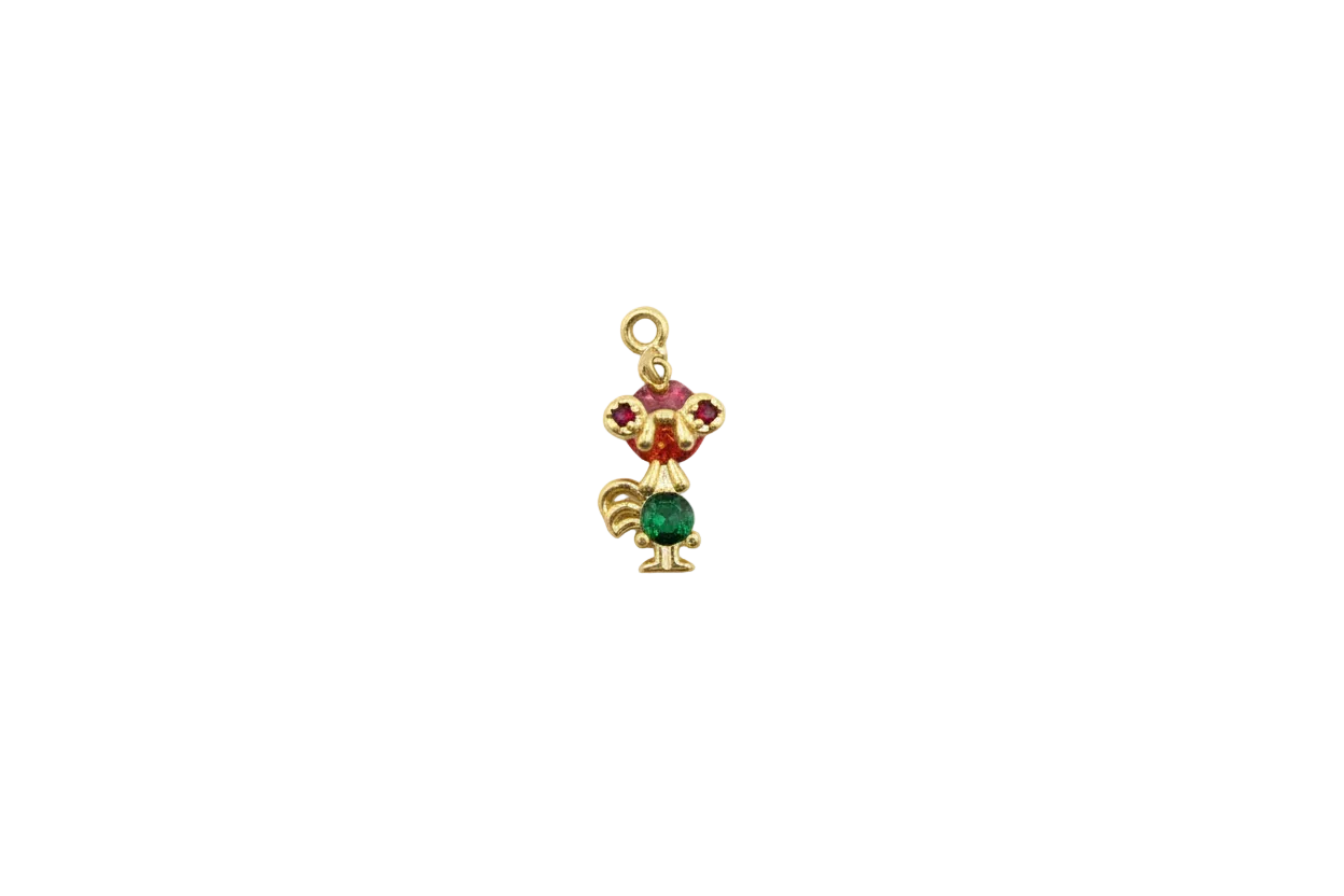 Gold mouse figure with red and green faceted gems