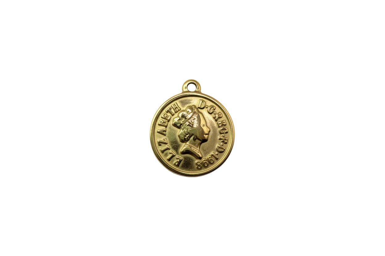 Gold coin-style medallion with raised profile portrait and embossed lettering