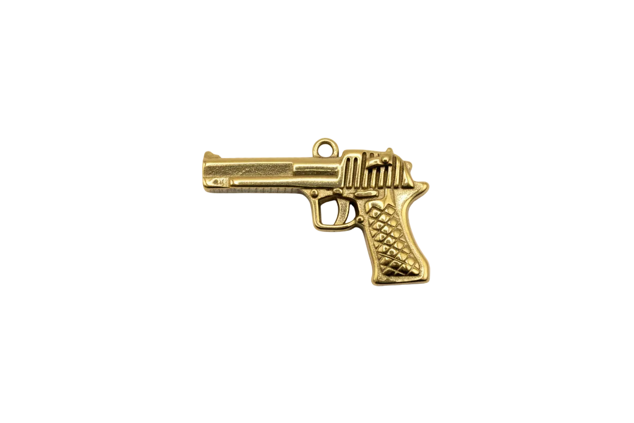 Gold pistol charm with textured grip