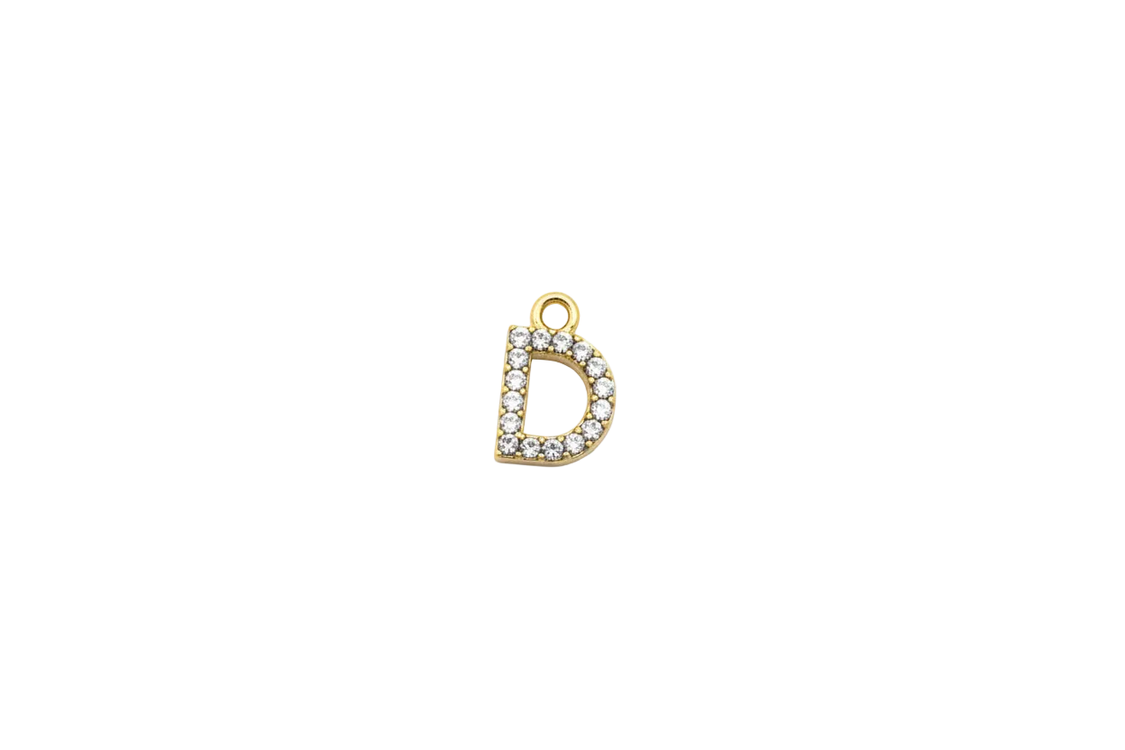 Gold pavé letter D with clear gems