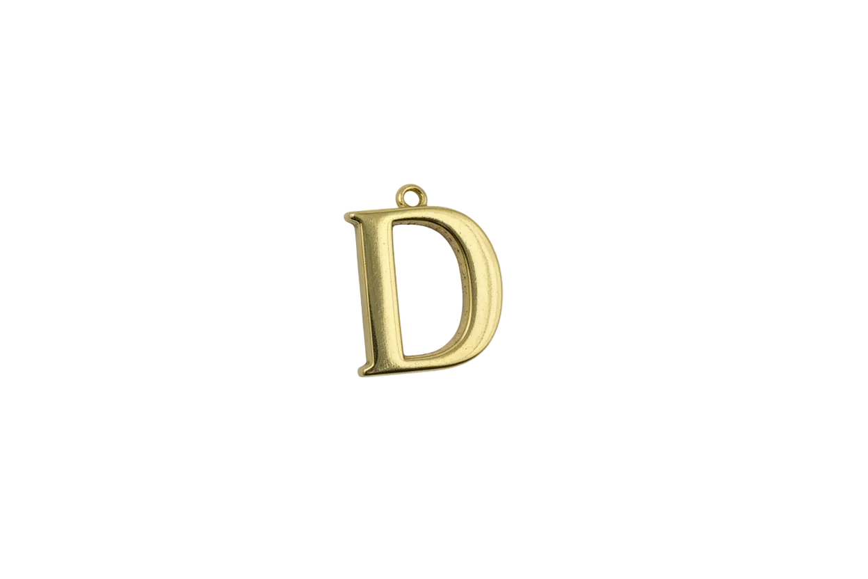 Polished gold letter D initial, bold block serif style