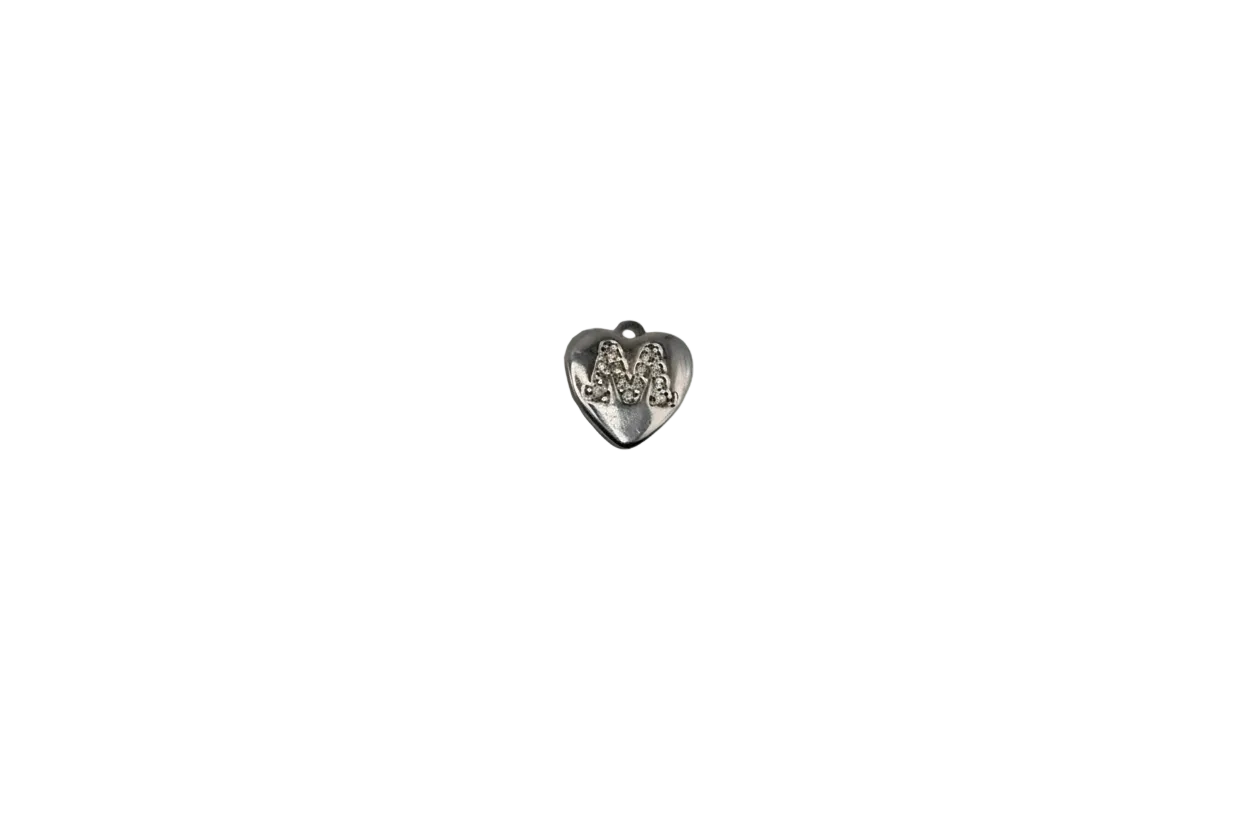 Silver heart with raised MA monogram