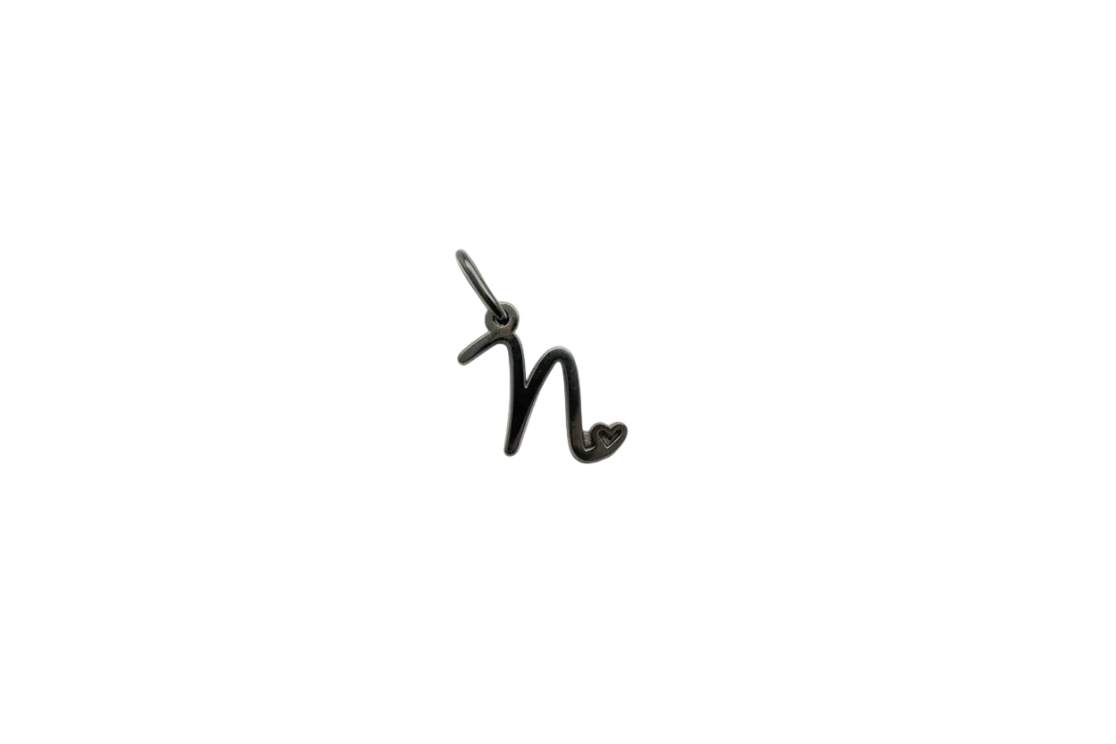 Silver script letter N with open heart