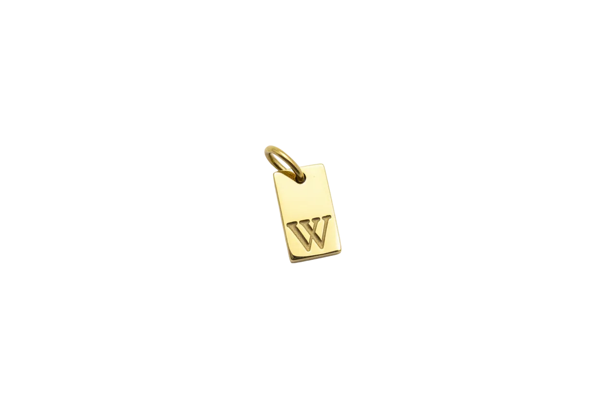 Gold tag with raised letter W