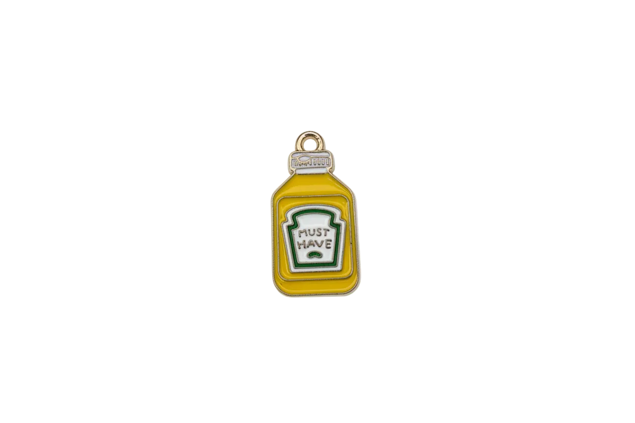 Mustard-yellow sauce bottle with white label and green outline