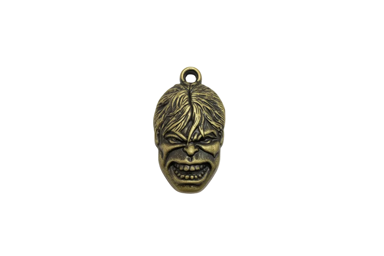 Antiqued gold snarling face mask with carved details