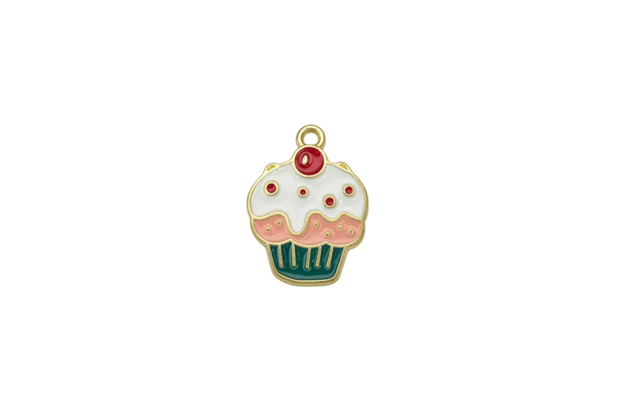 Gold-outlined cupcake with white icing, pink frosting, teal wrapper, red cherry