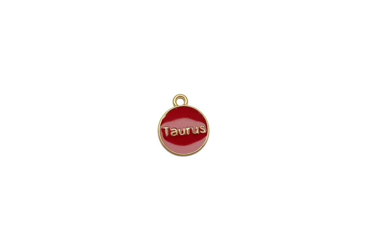 Red Taurus disk with raised gold lettering