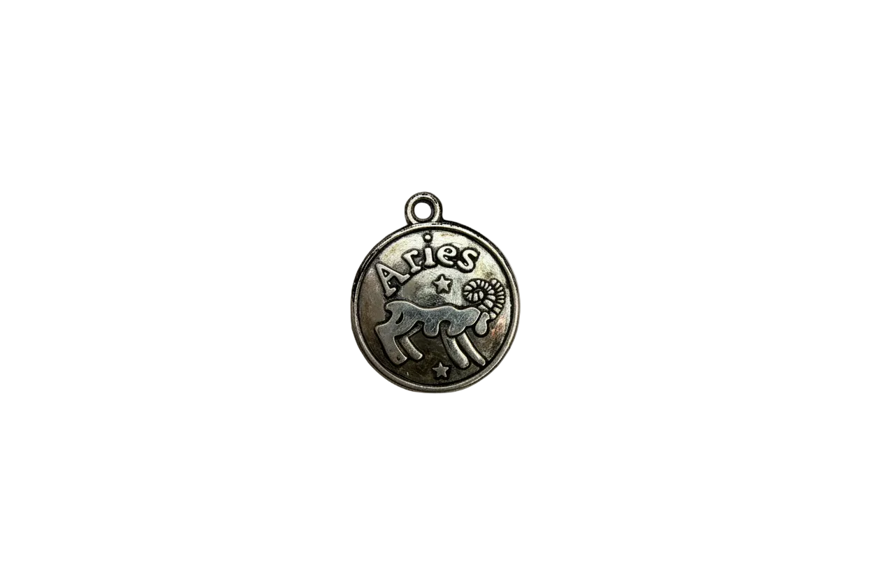 Silver Aries zodiac medallion with ram and stars