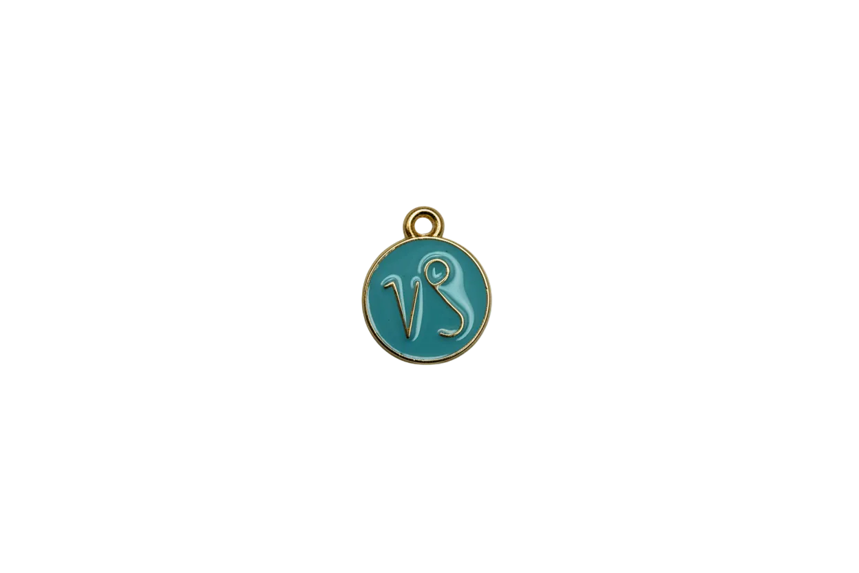 Teal enamel disc with gold VS monogram and gold rim