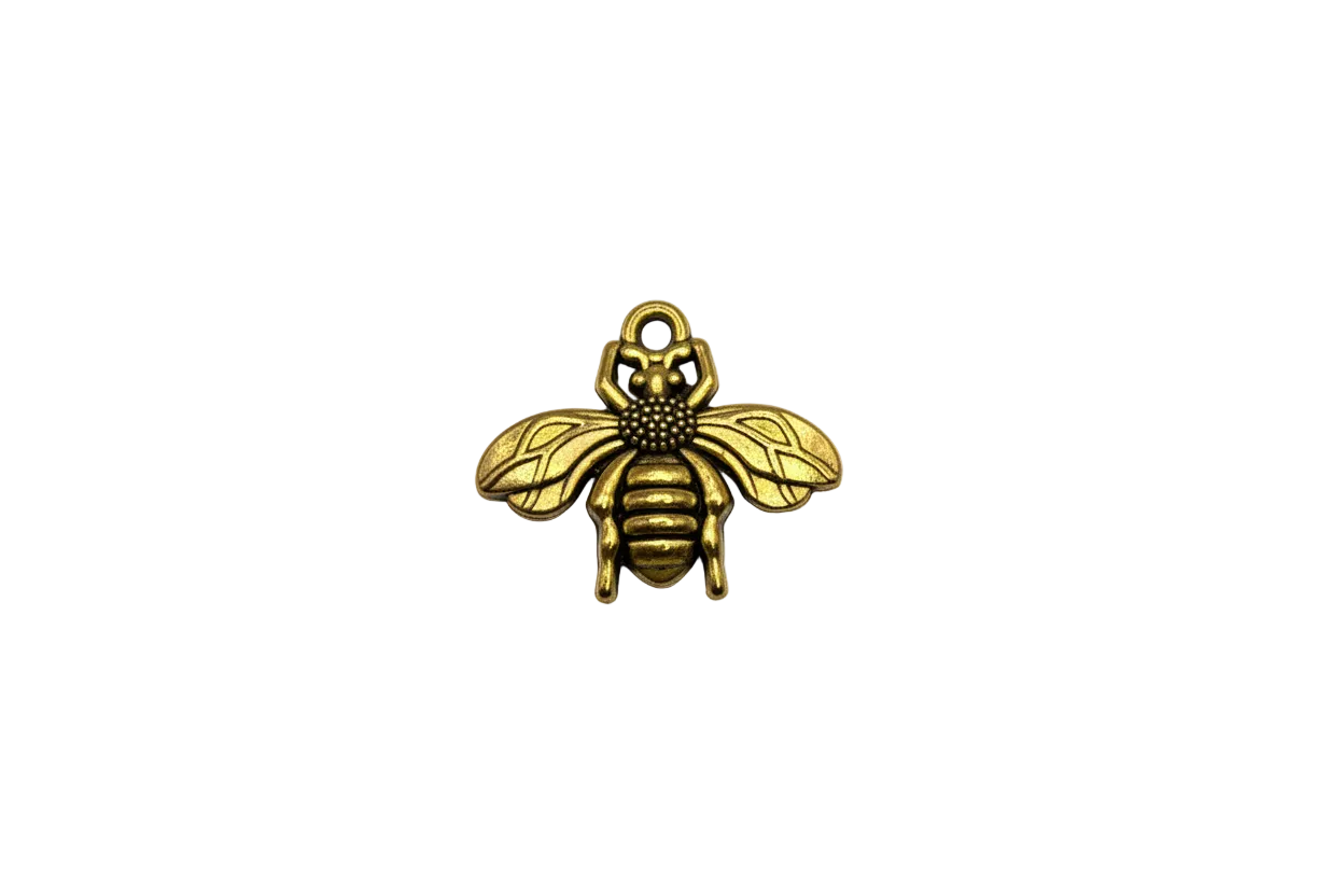 Antique gold bee with engraved wings and textured body