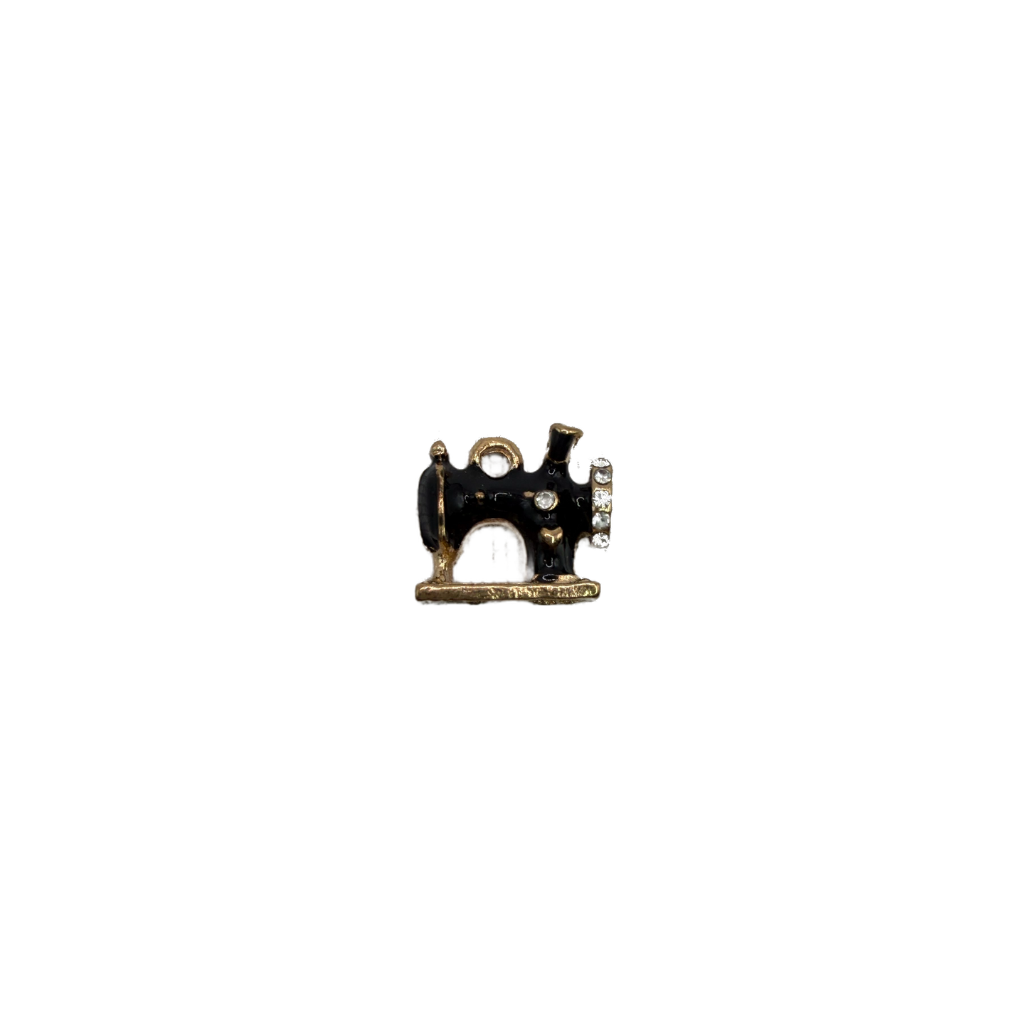 Black enamel sewing machine in gold with clear crystals