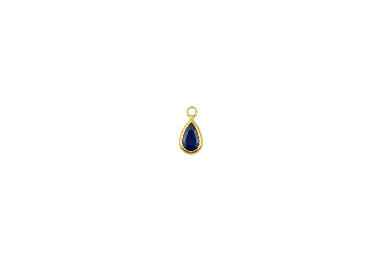 Gold teardrop charm with blue gem