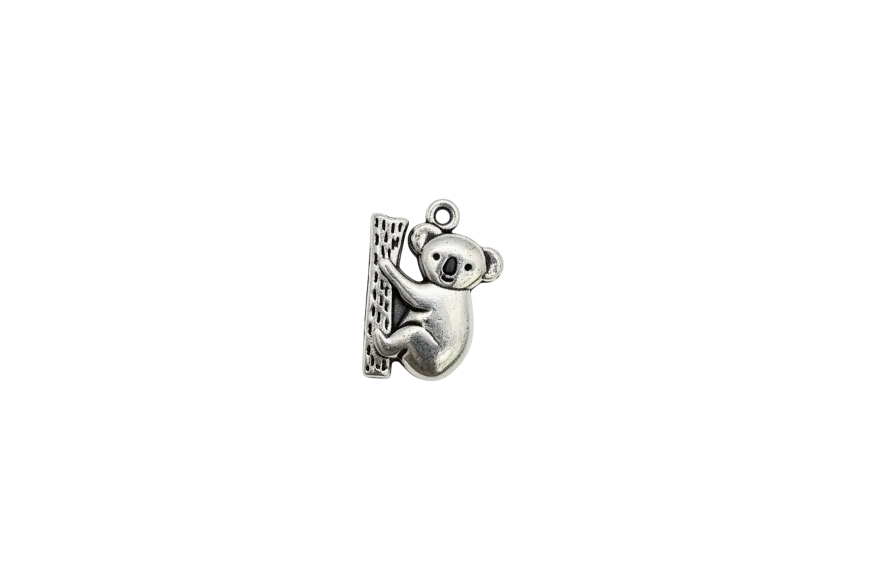 Silver koala on textured tree trunk charm