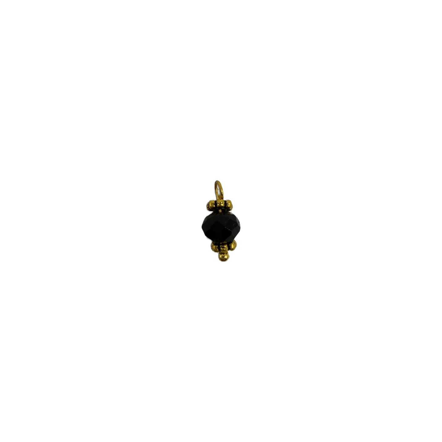 Faceted black gem with gold bead accents
