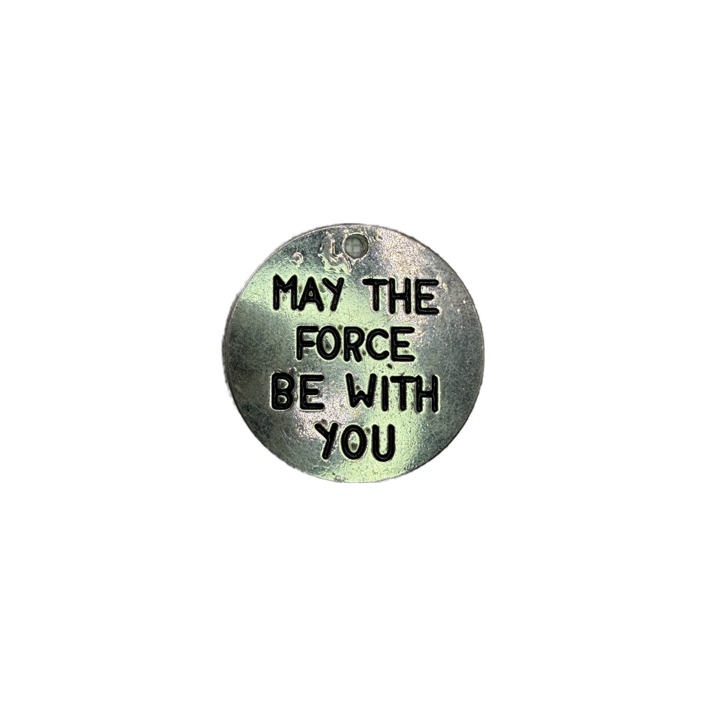 Antiqued silver-tone engraved message coin with black lettering
