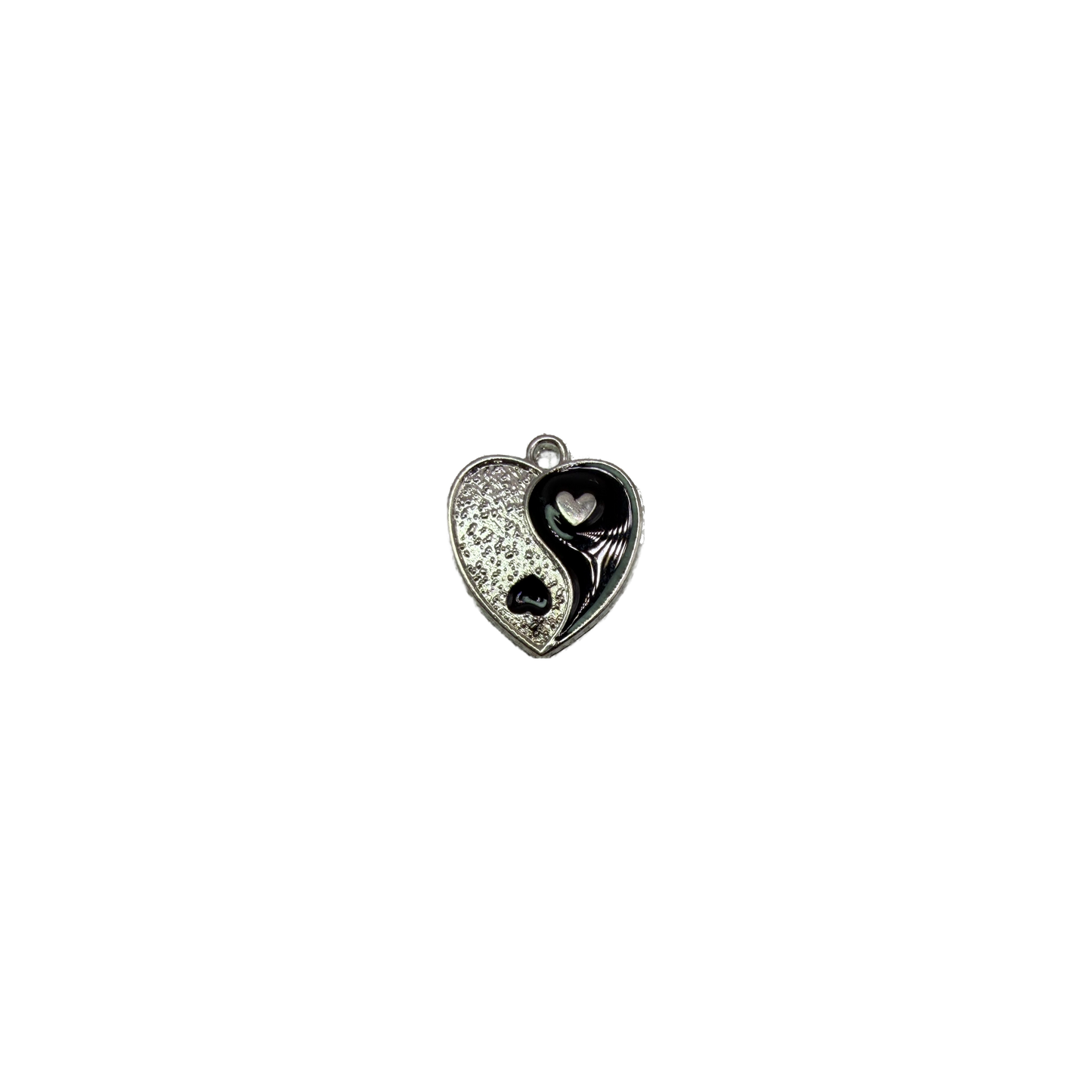 Two-tone yin-yang heart in silver and glossy black enamel