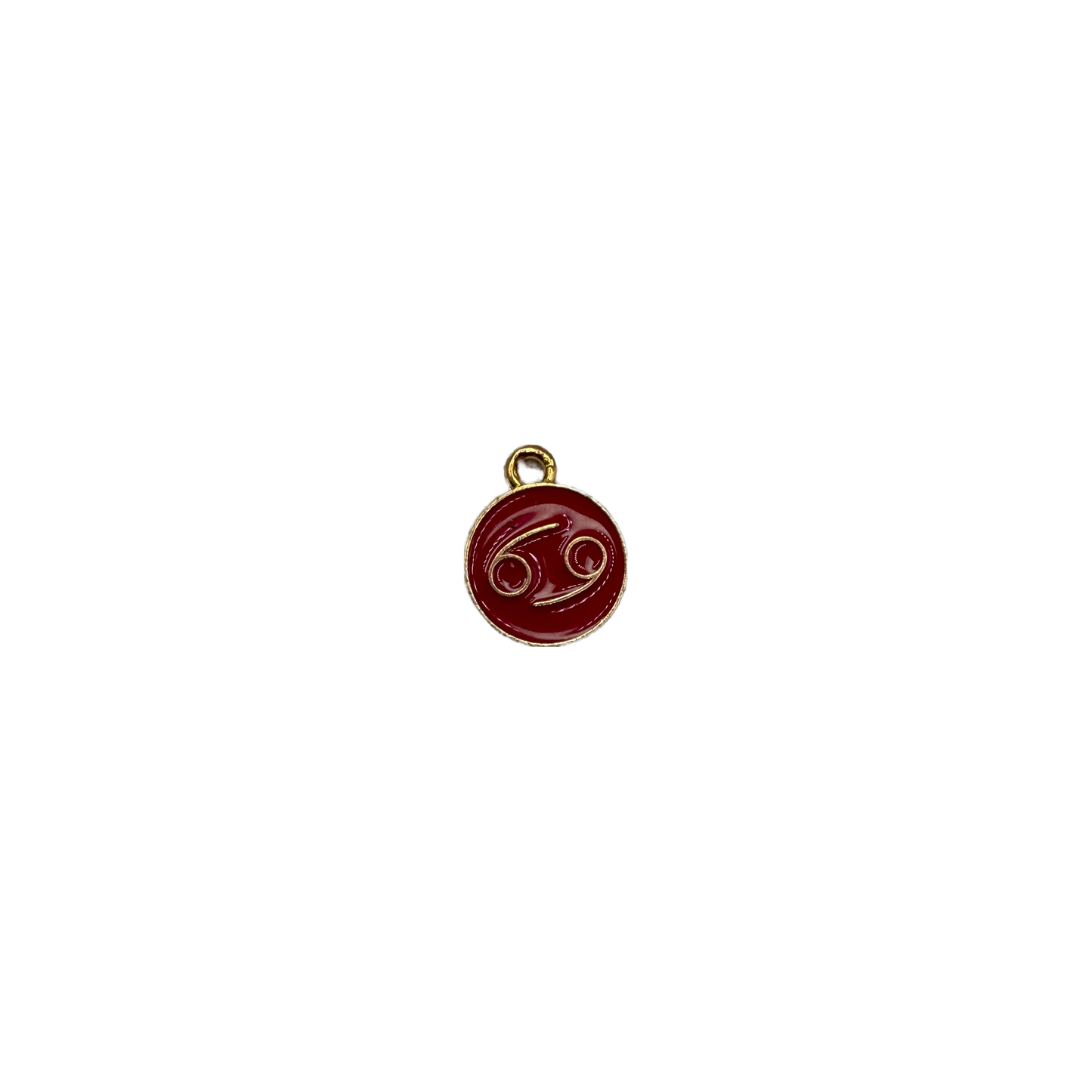 Crimson Cancer zodiac medallion in gold detail