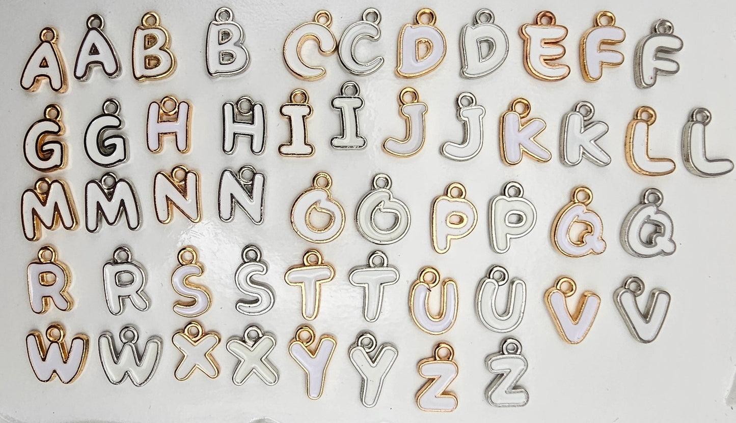 White Handwritten/ Gold Outlined Letters