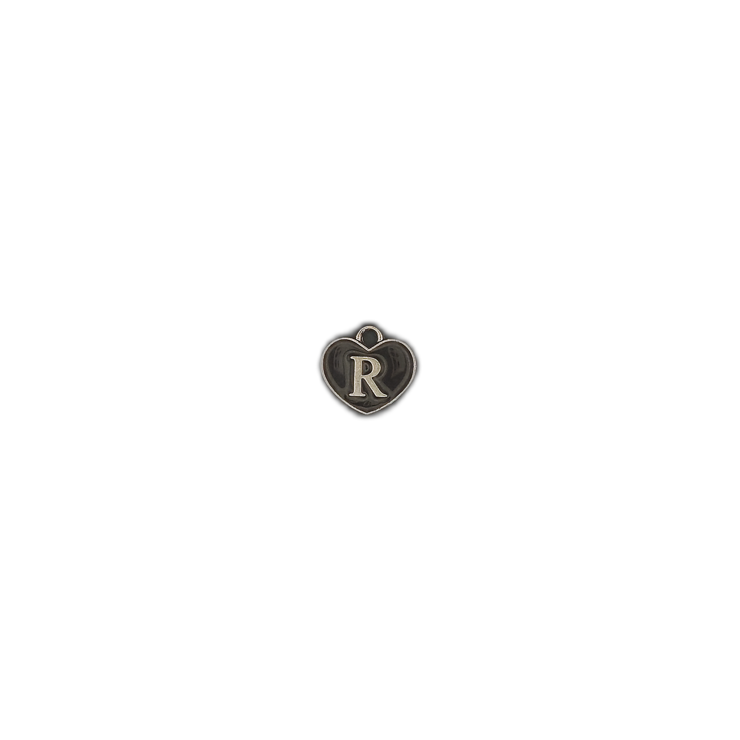 small heart-shaped letter R charm on black background