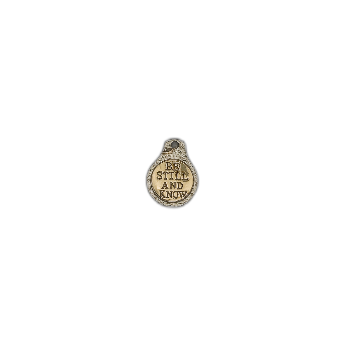 small round two-tone charm with BE STILL AND KNOW centered on black background