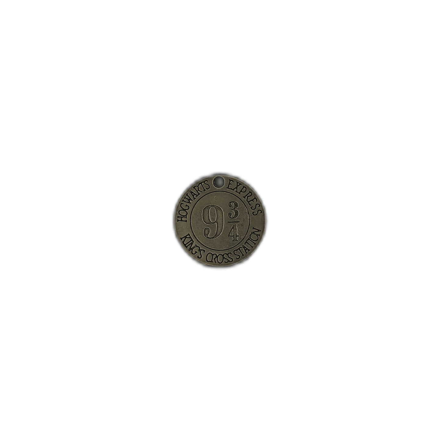 Full view of small round bronze text charm on a black background.