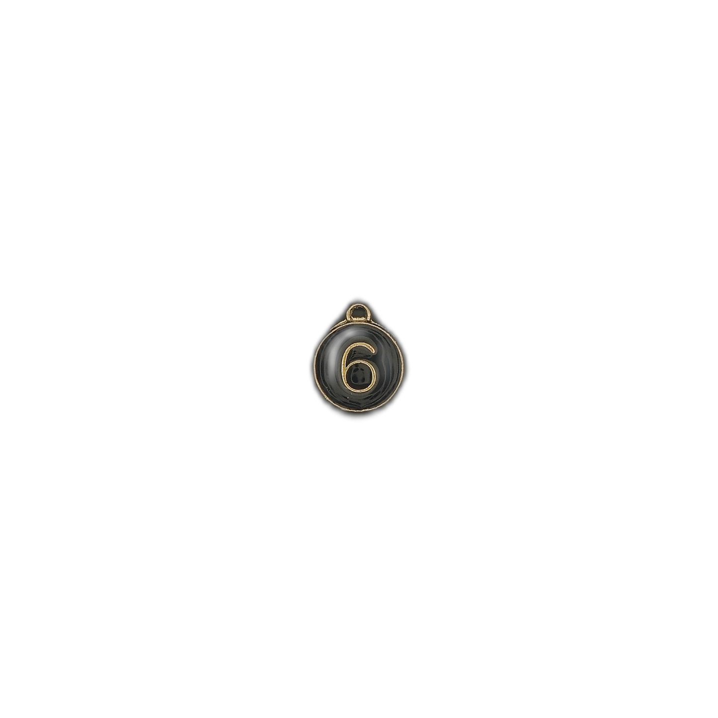 small round charm showing a gold-outlined number 6 on black enamel