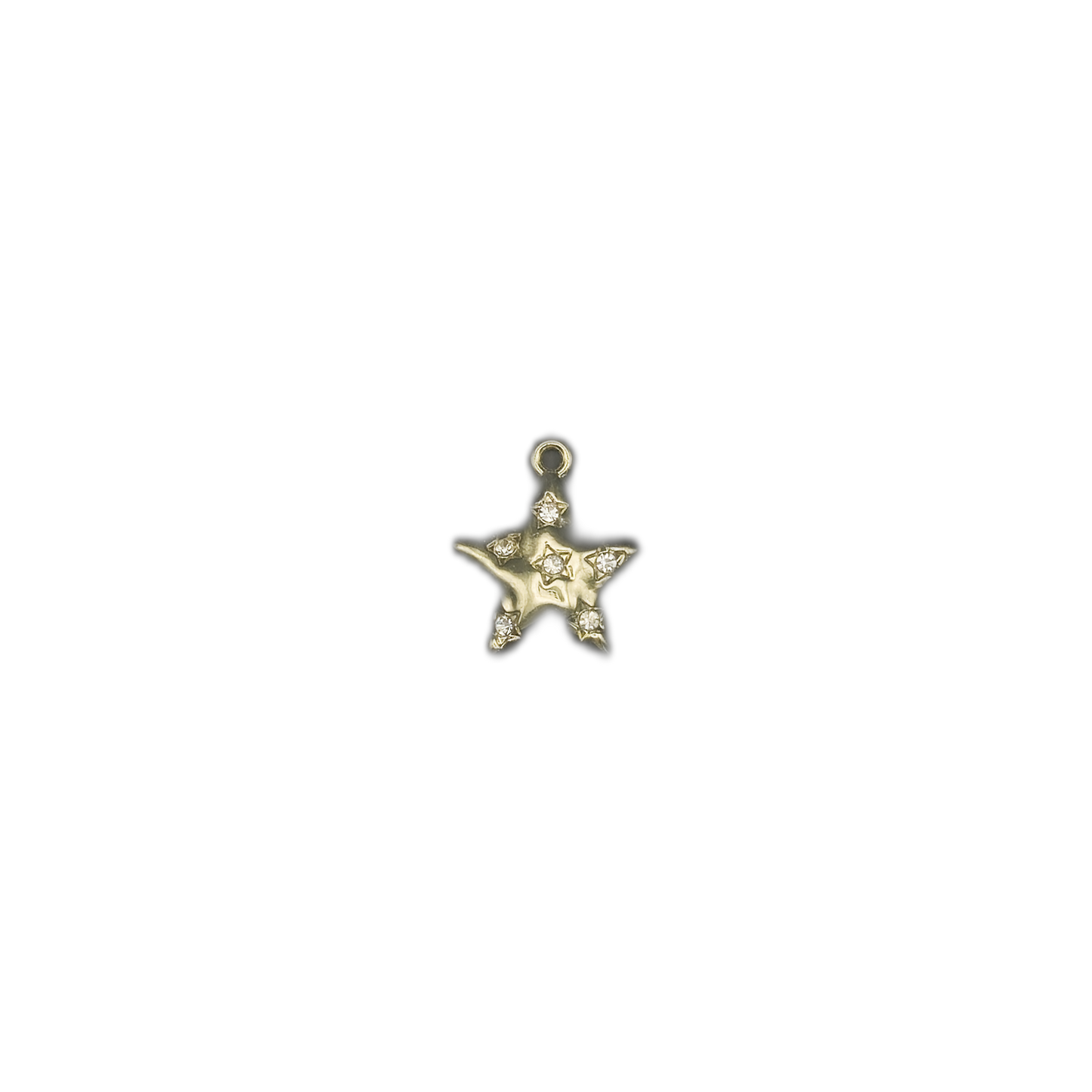 full view of small gold star charm with clear stones on black background