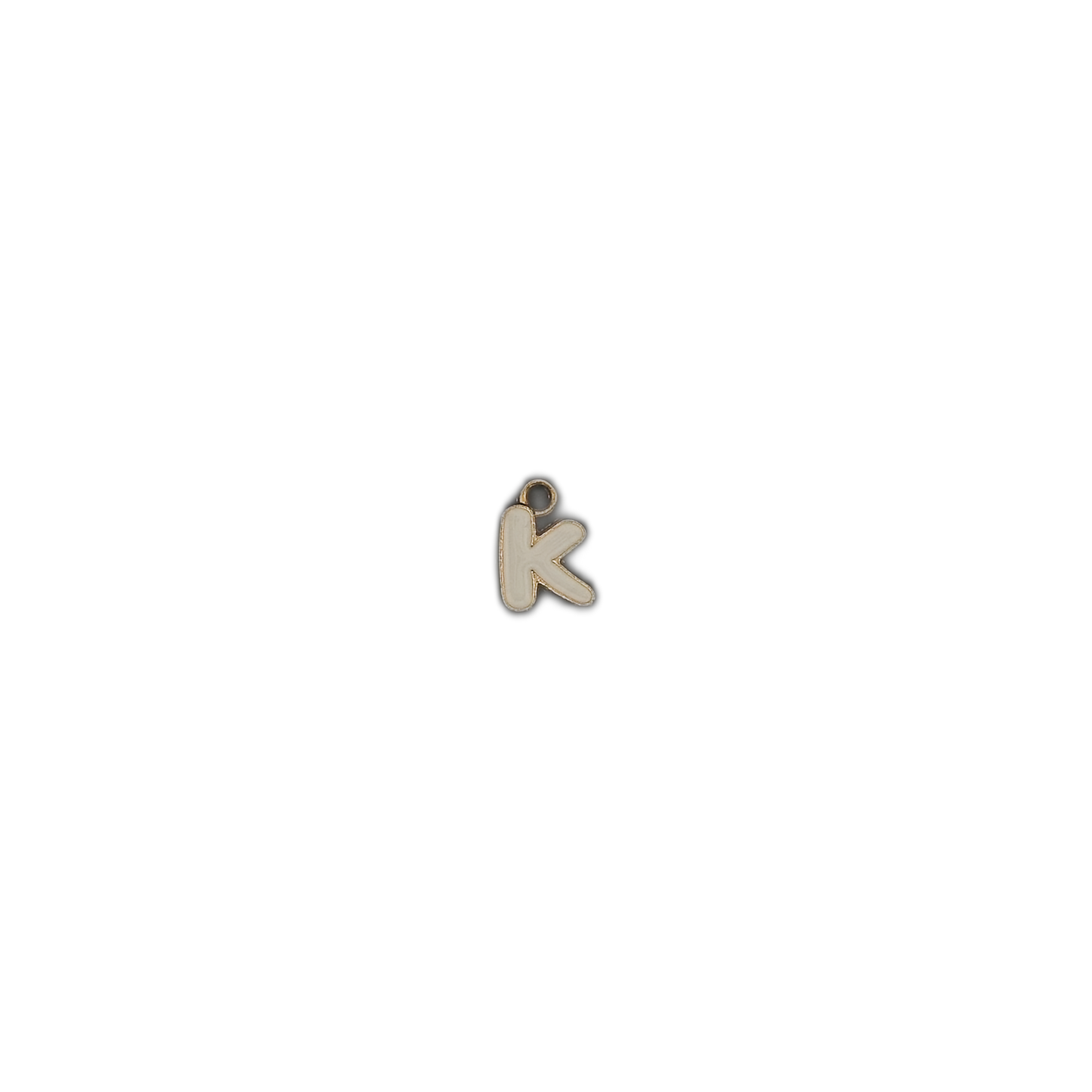 Small lowercase k enamel charm with gold outline centered on a black background.