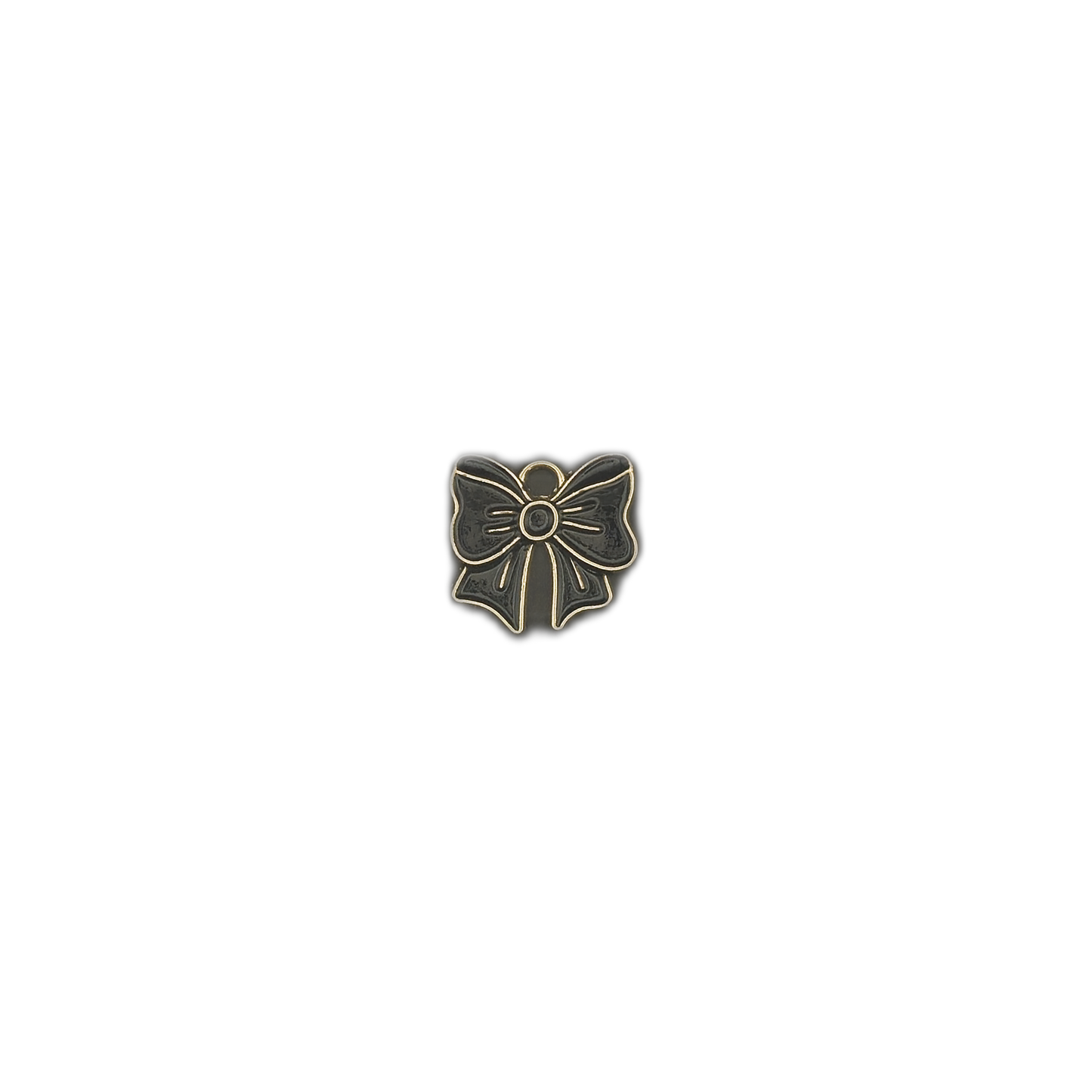 small black and gold bow charm centered on black background