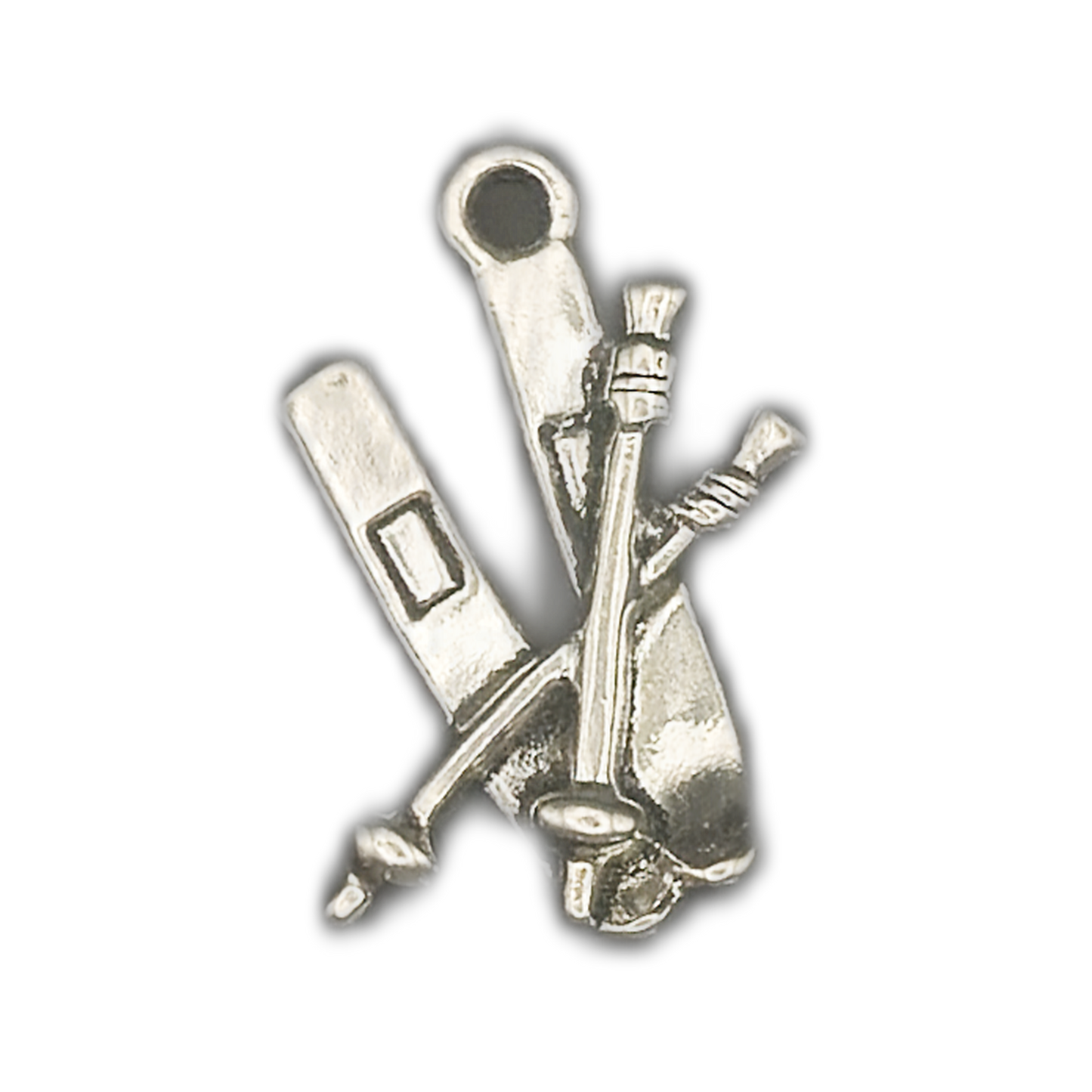 silver ski equipment charm with ski, poles, and boot on black background