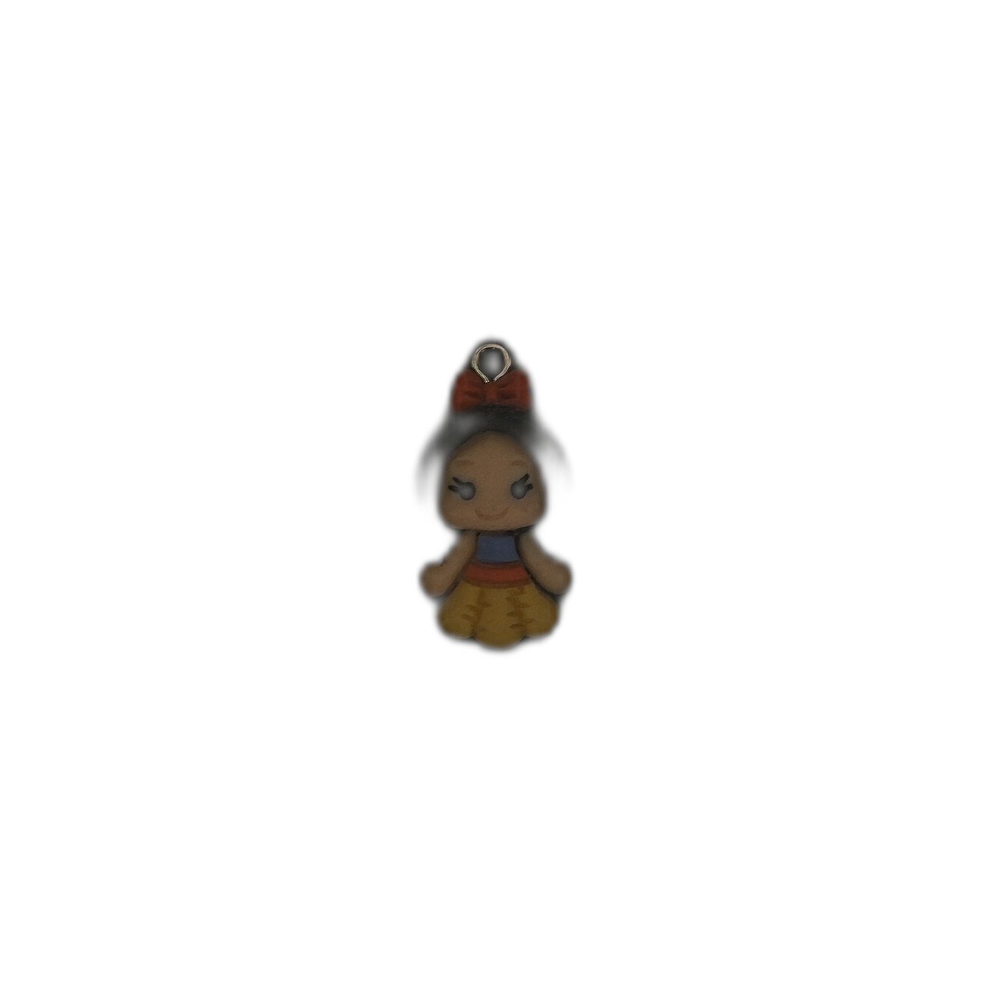 full view of cartoon princess charm with black hair, red bow, blue top, and yellow skirt on a black background