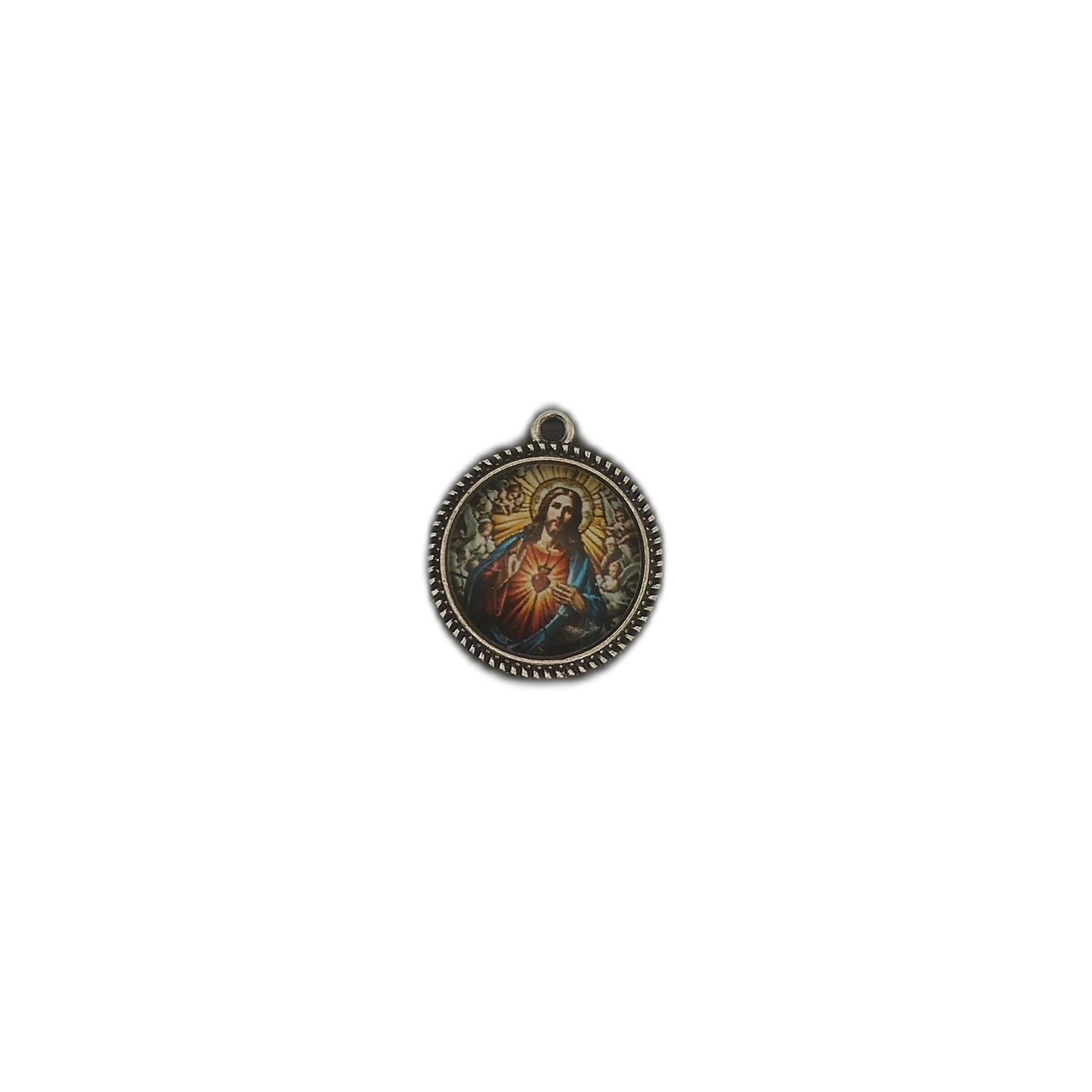 small round sacred heart charm centered on black background