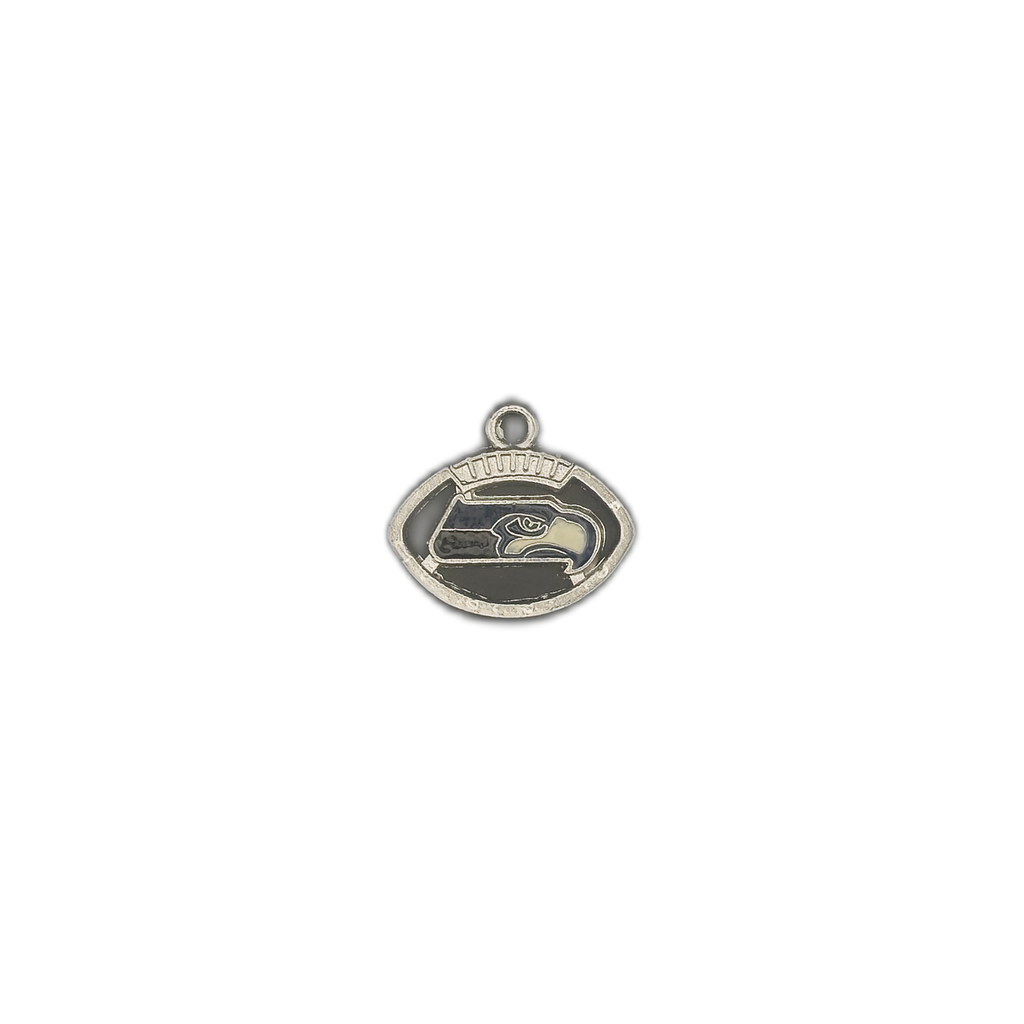 small silver-tone football charm showing a stylized hawk head in enamel