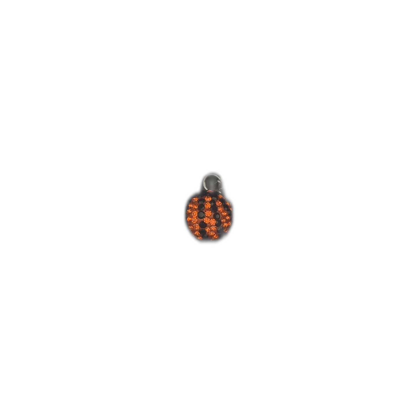 small round charm with orange rhinestones and black pavé accents