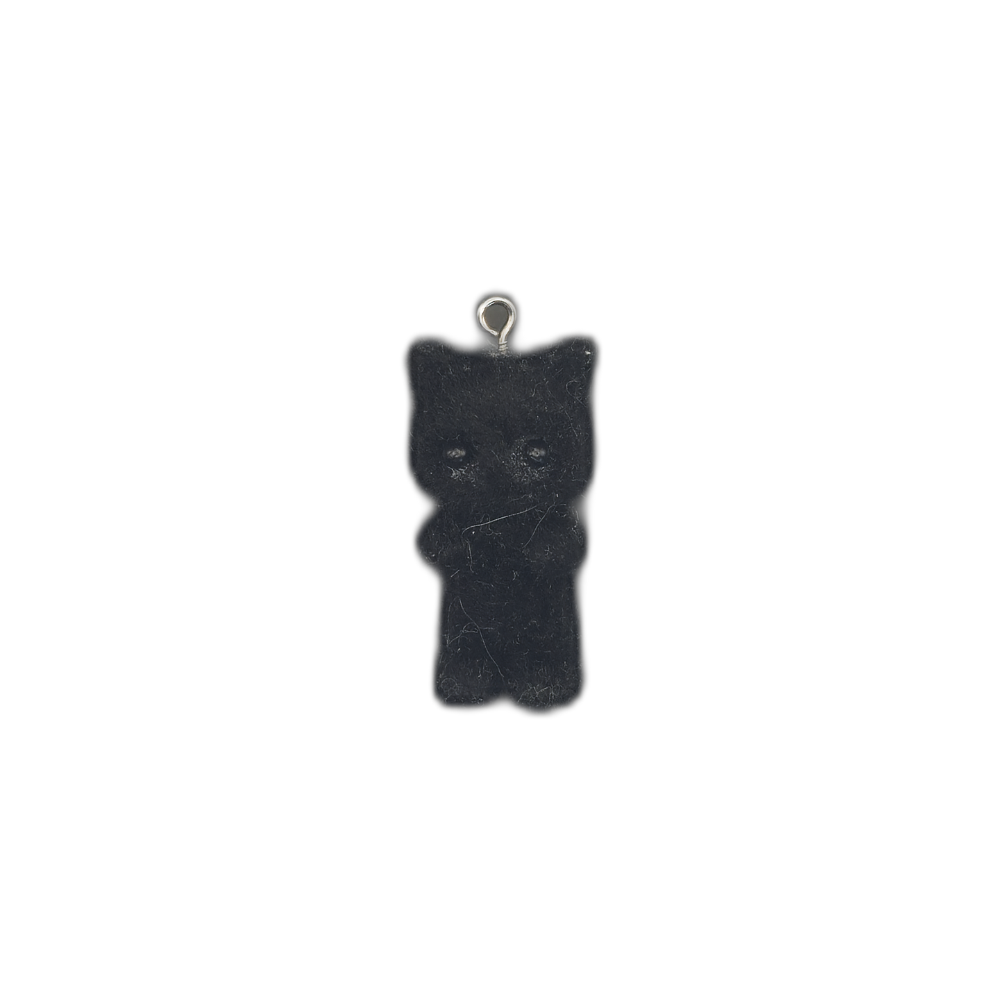 full view of a black gummy bear-shaped charm centered on a black background