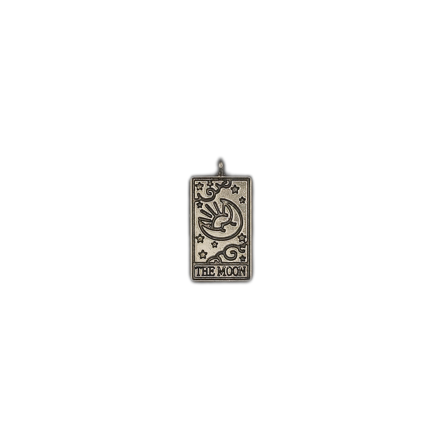 Full view of a silver-tone rectangular moon and stars tarot charm centered on a black background.