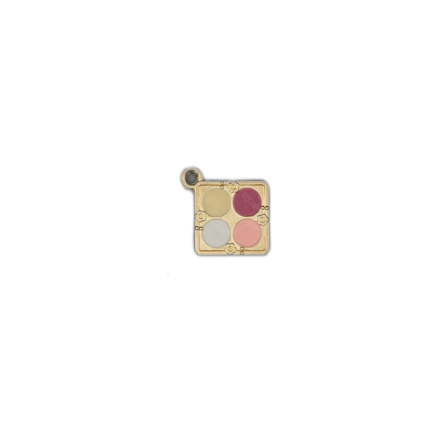 small gold-tone makeup palette charm with four enamel colors centered on a black background
