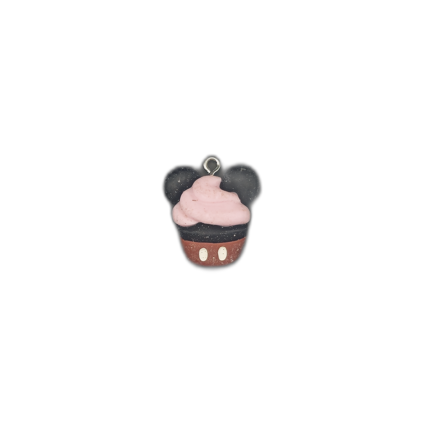 small mouse-ears cupcake charm centered on black background